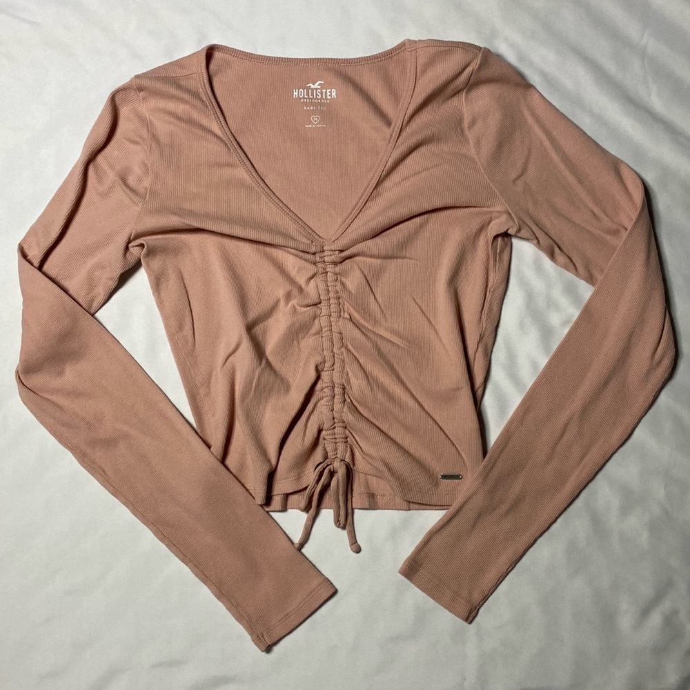 Size M dusty rose long sleeve top with adjustable tie